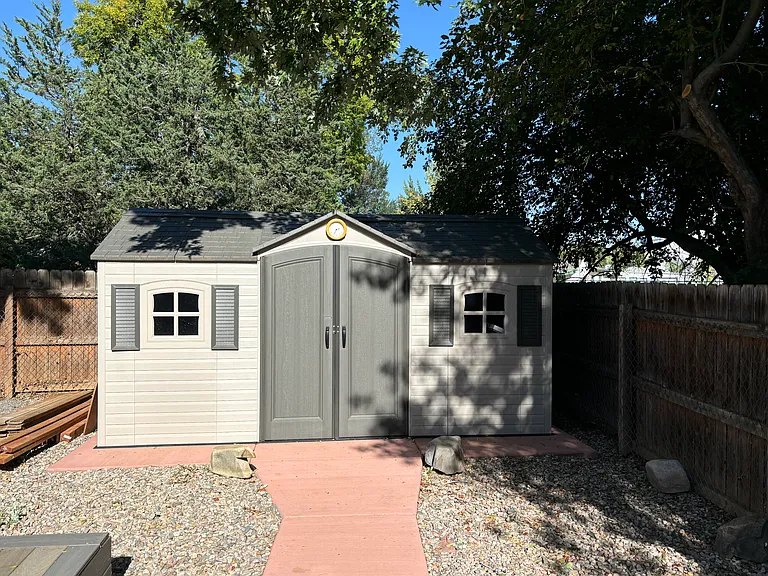 8x16 storage shed in backyard
