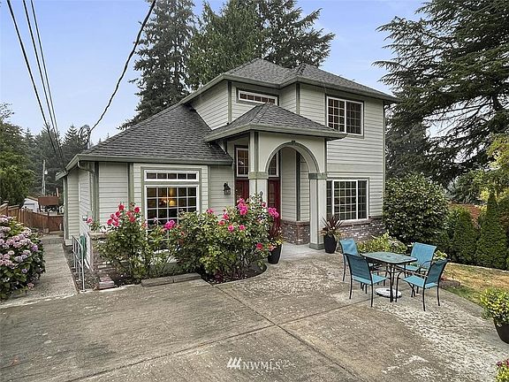 This Well Maintained Home was Well Designed and Constructed of Quality Materials in 2003. The Treed Site includes a Paved Ramp to the left of the home that provides access to the Fenced Back Yard with Alley Access.