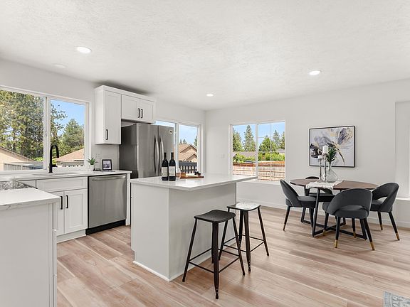 5th image of 6109 E 8th Ave