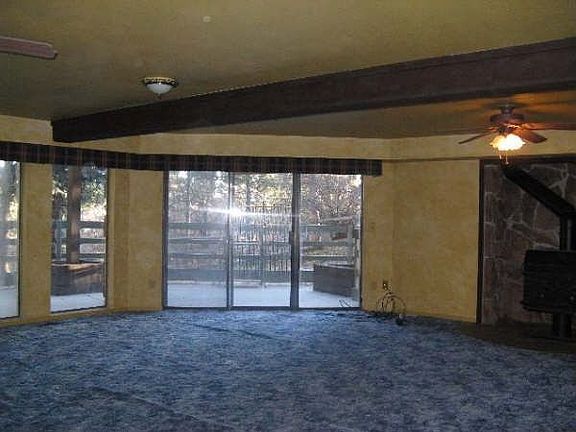 Wood Stove in Family Room that walks out to covered Patio