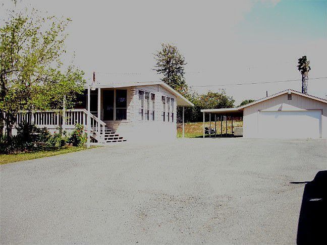 Manufactured Home 1440 sq ft & 1000 sq ft 4-car stick-built newer garage