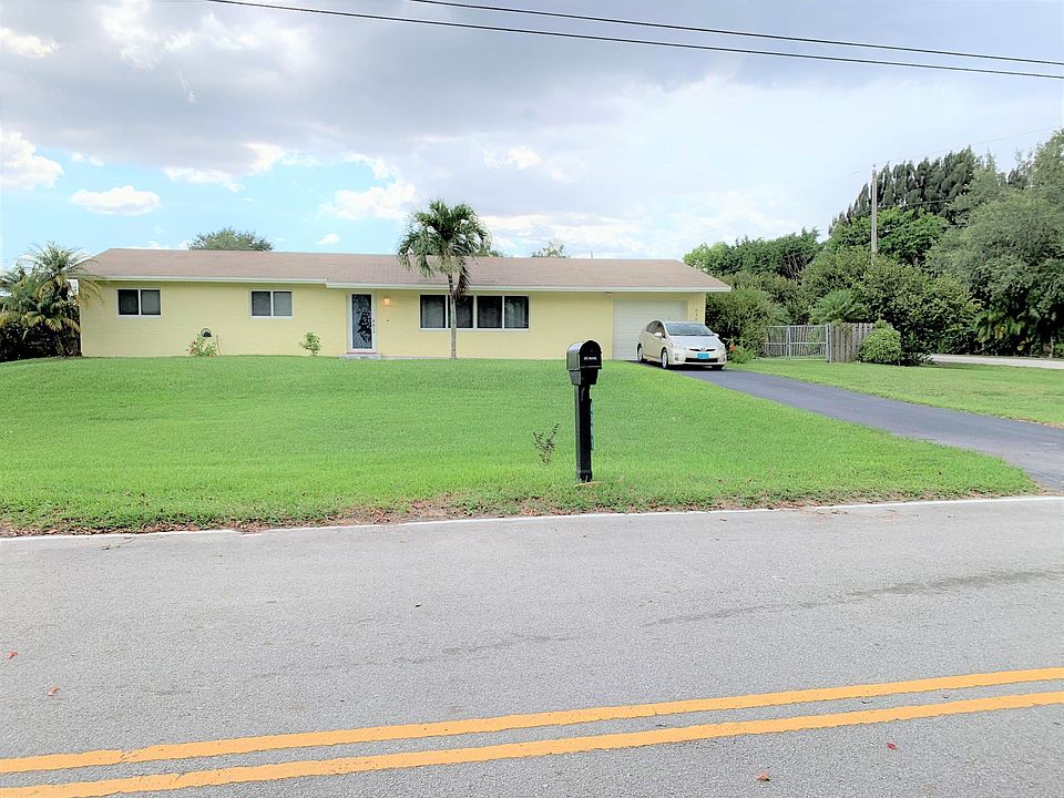 Street view of home and side road.