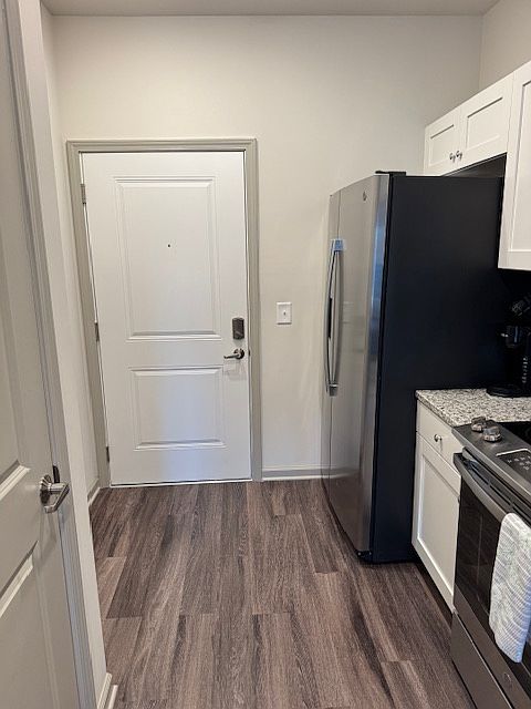 View of the front door from the living room.