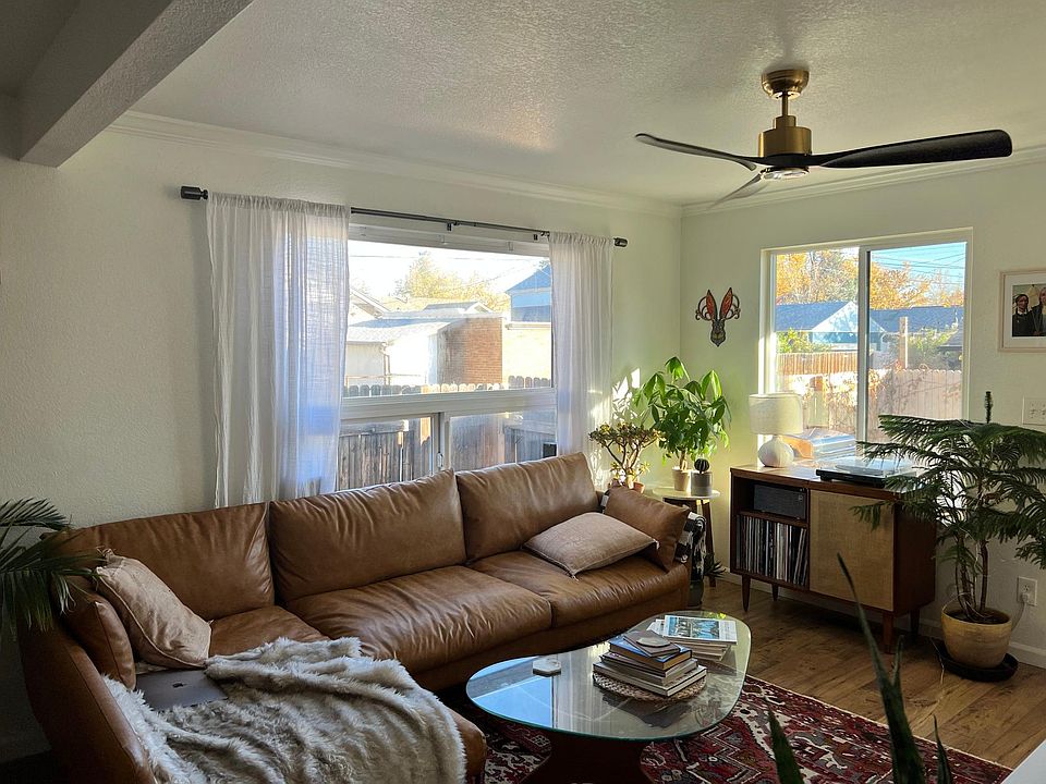 Living room with tons of natural light, new smart fan installed