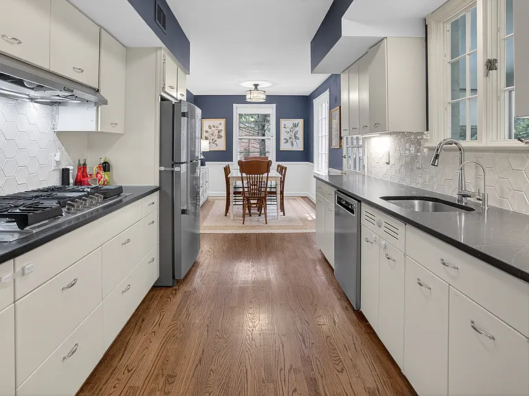 Kitchen with quartz counters.