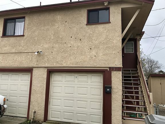 Upstairs Studio with a single car garage.