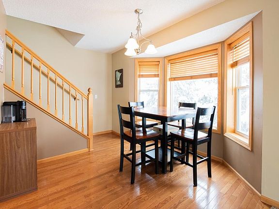 Bay windows let in plenty of light to the kitchen and informal dining area