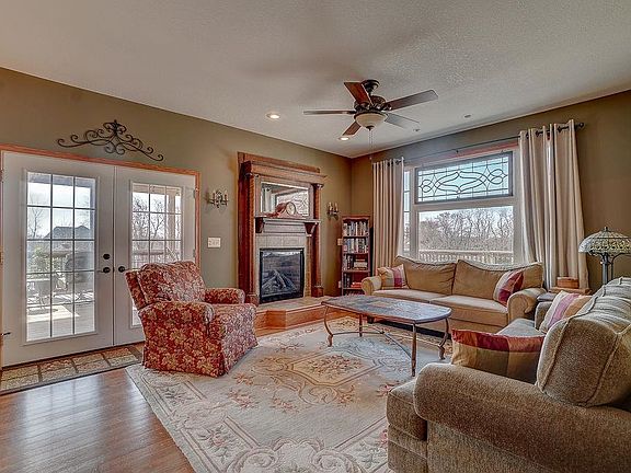 gas fireplace with antique mantle in the living room