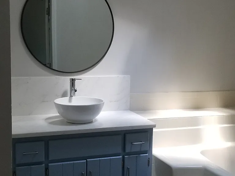 New stone counter top and basin sink in the Main bathroom