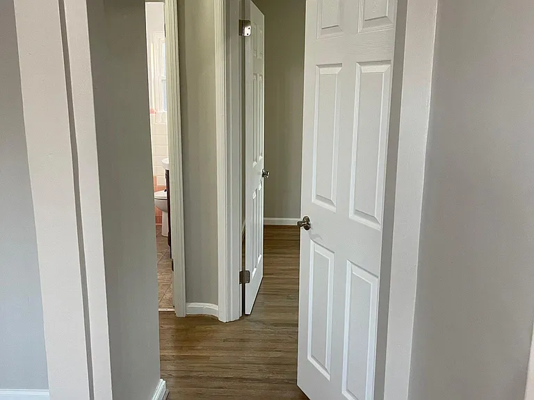 Entryway to the 1st floor bedrooms and 1st floor full bathroom
