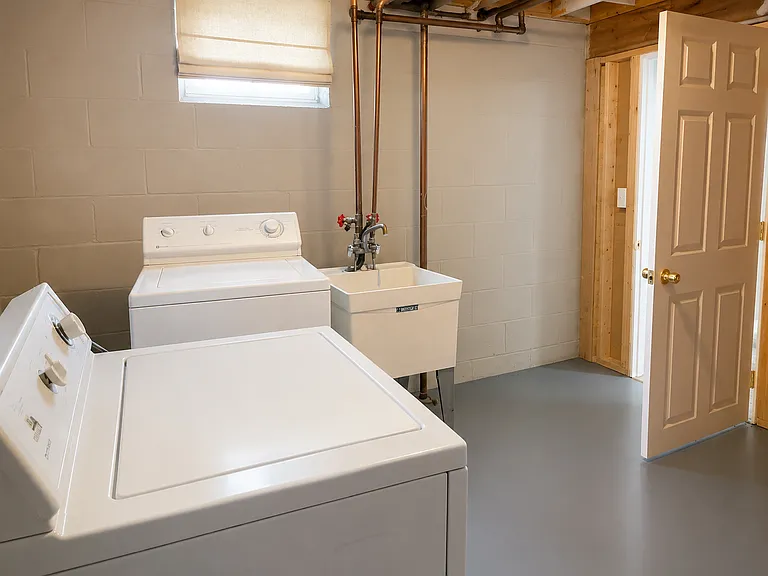 Lower-level laundry room, washer and dryer
