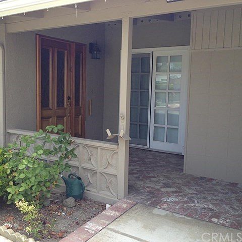 Entry patio with brick flooring