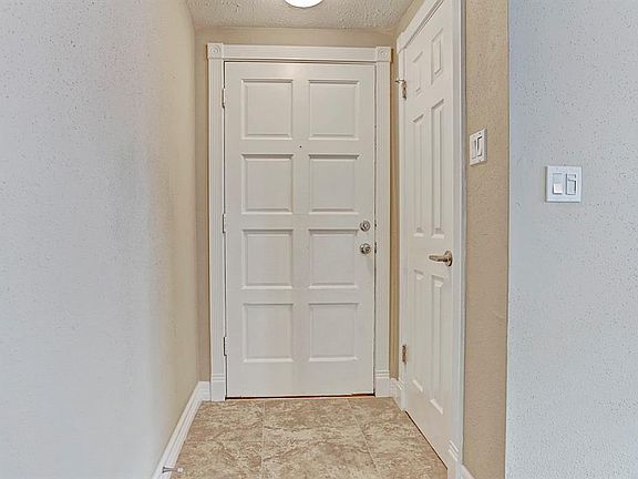 Right when you enter the front door you will see some great qualities of the home such as molding around the doors.