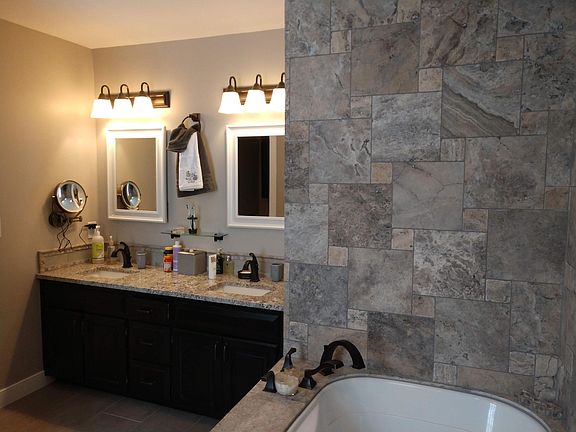 Beautiful MBR bath room with heated floor, floor to ceiling tile...