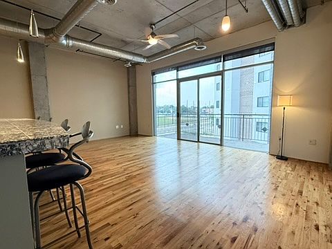 Living and dine-in kitchen bar, a wide open floor plan
