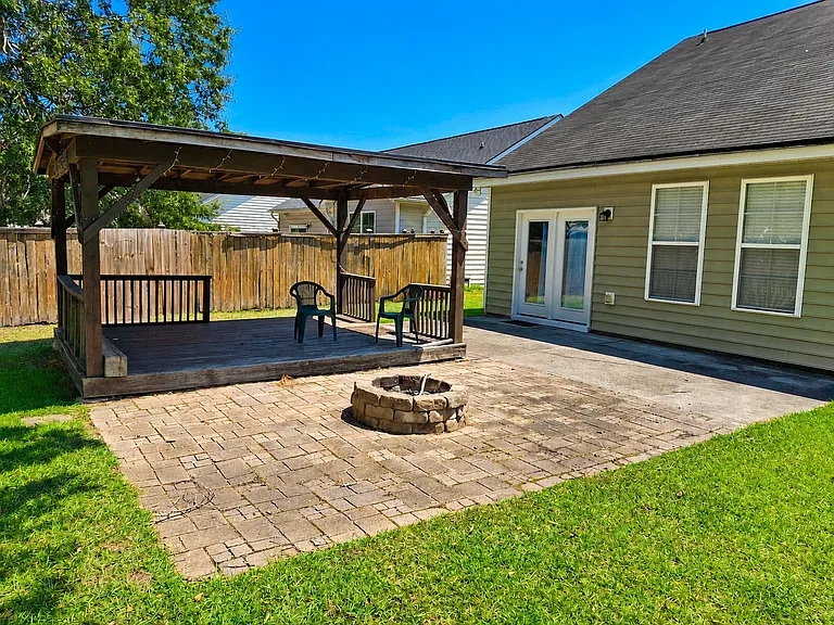 10' x 10' fire pit area adjacent to it to enjoy the pond views.