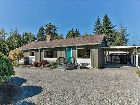 Enjoy the Large Gravel Loop Drive Way Up To Your Home!