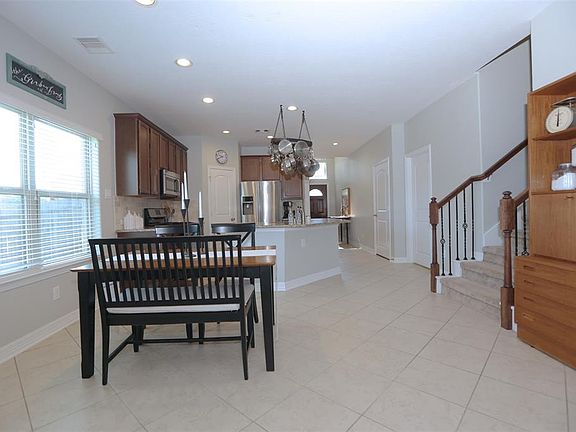 The kitchen and breakfast area flow together with the island for additional seating.