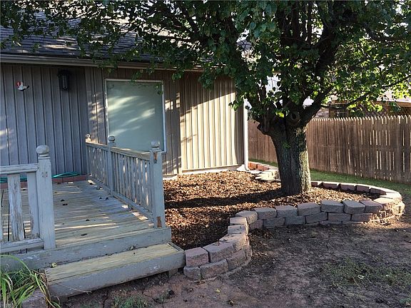 View of deck. The home has siding on the whole home.