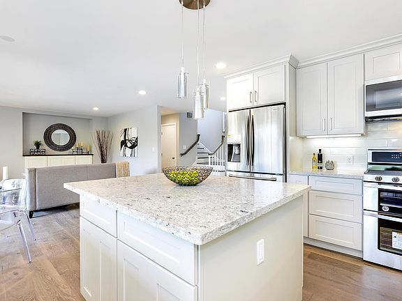 Large Island with lots of storage. One year new gas stove.