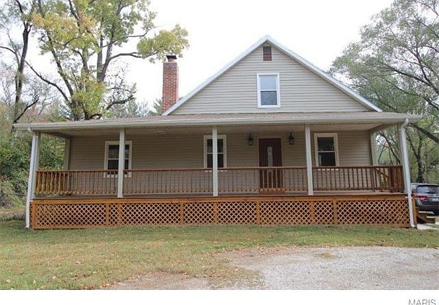 Front View with new porch, siding, windows, and roof in 2014!