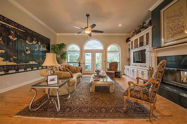 Living room with custom, hand-painted cabinetry.
