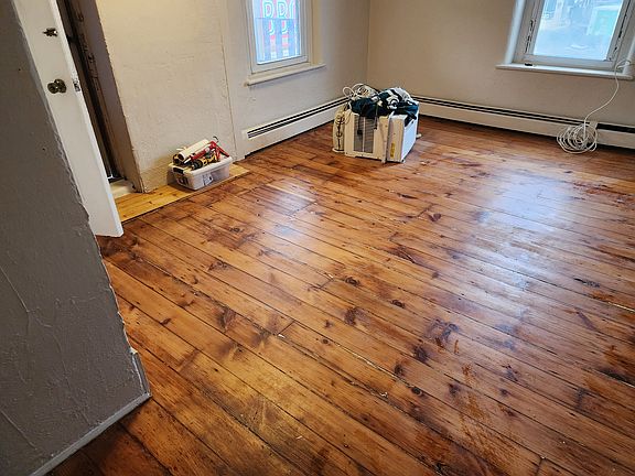 living room with recently refinished hardwood floors