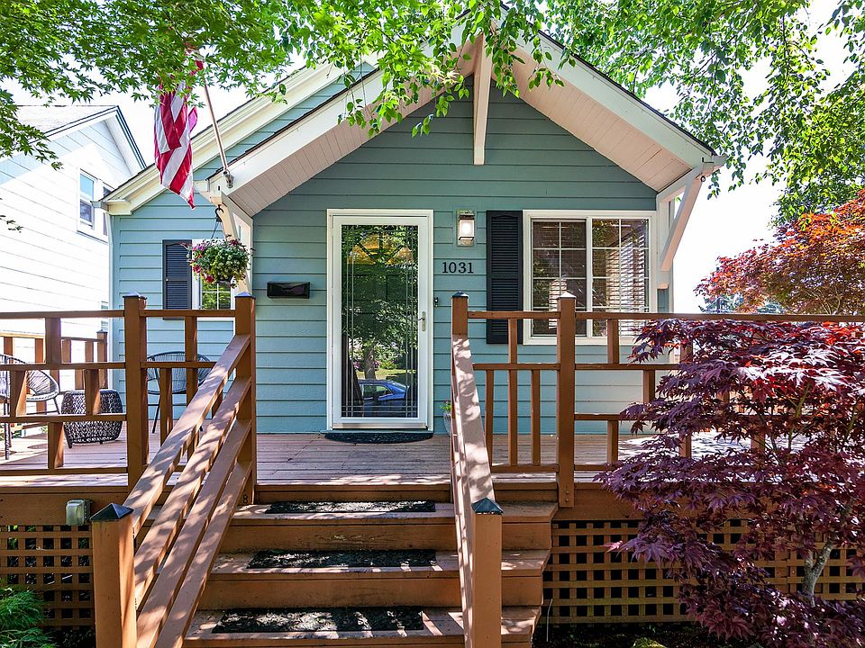 Delightful bungalow surrounded by trees.