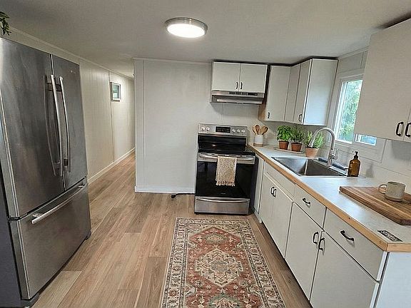 2nd image of 4882 Lancaster Dr NE Unit 12