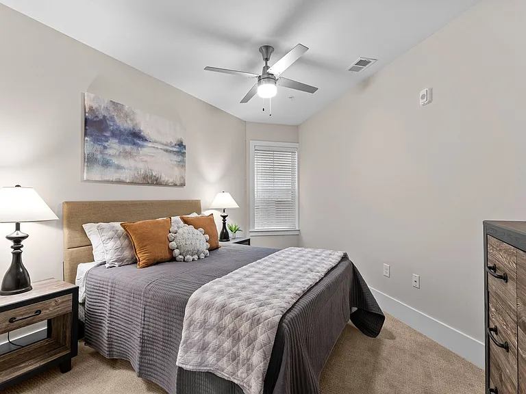 Active Adult bedroom with ceiling fan