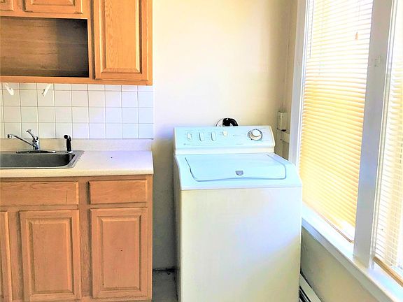 Washing machine in unit