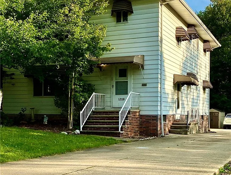South Side and East side of the building. Both doors lead to the inner common hallways that lead to both units.
