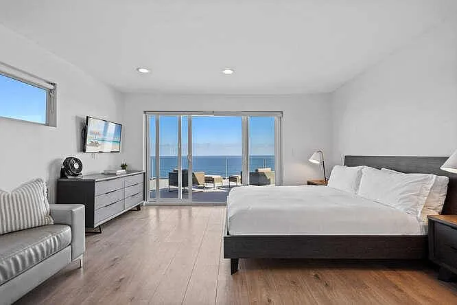 Unwind in the comfort of our third bedroom's queen bed, offering a peaceful retreat.