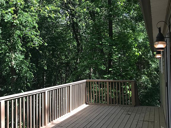 Large back deck overlooking river