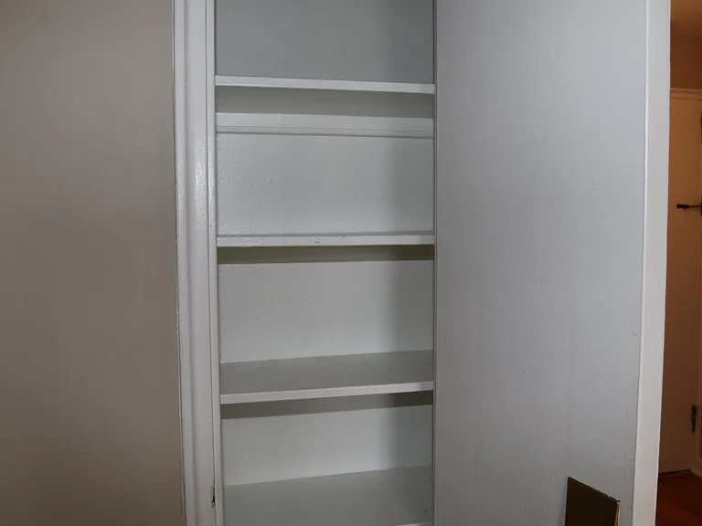 Closet by the kitchen and bathroom