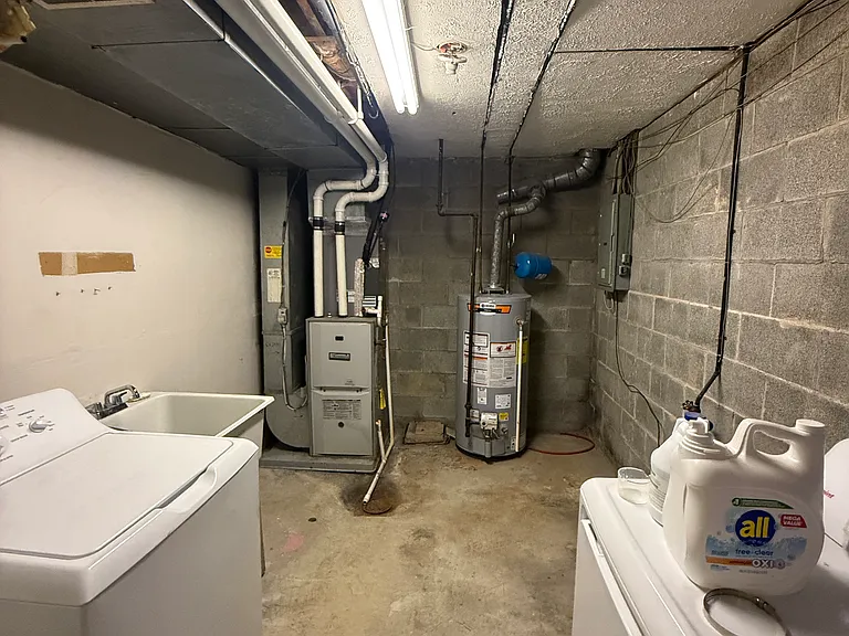 Laundry Room with brand new washer and dryer