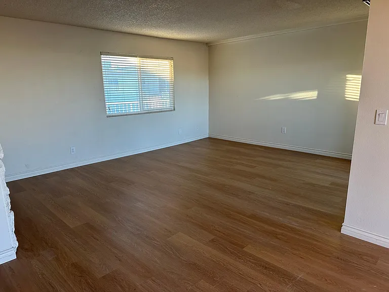 Spacious living room with upgraded Luxury vinyl plank flooring throughout