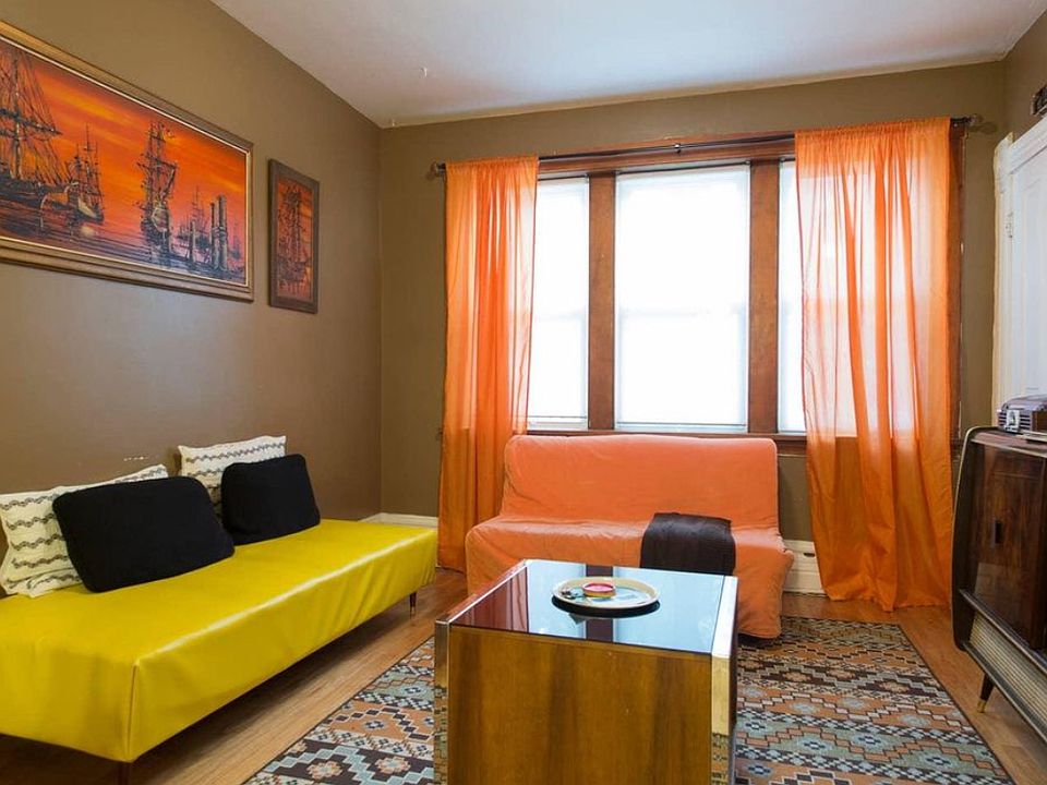 staged photo of living room - room has since been painted / renovated