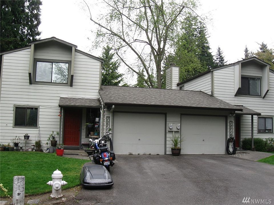 Lovingly maintained Side by Side Townhome Duplex.  The townhomes are attached only at the Garages.