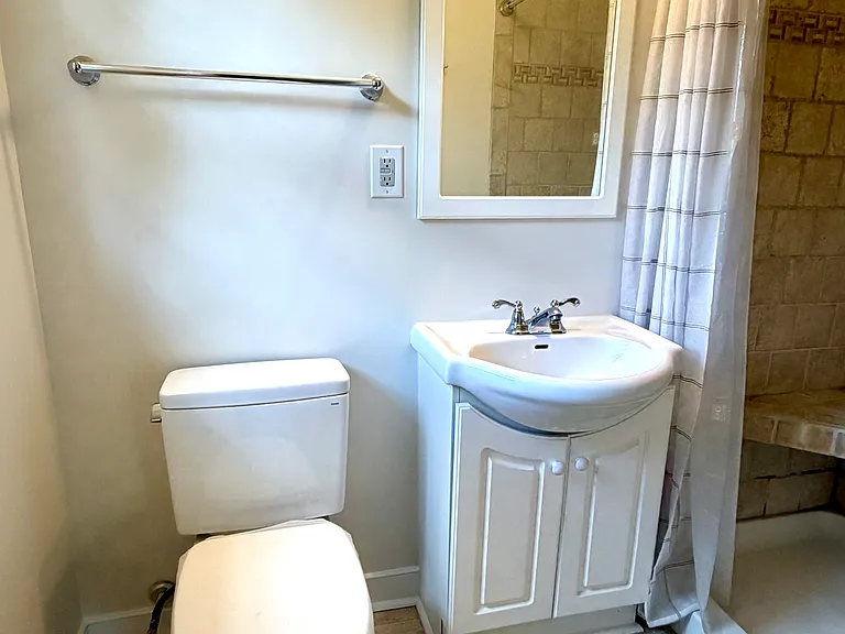 Primary bath with tile shower and new Toto toilet