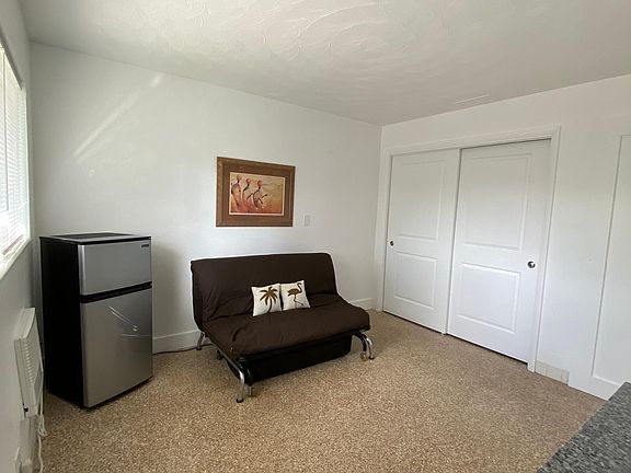 view from the main entrance and visible 2 sliding doors of the closet