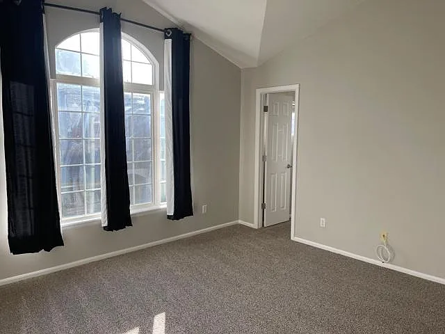 master bedroom with door to closet