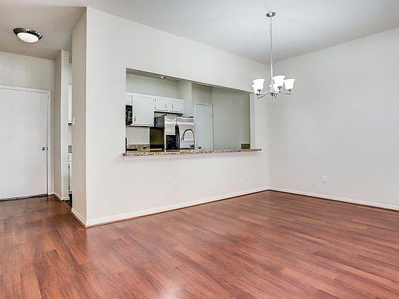 Space in front of the breakfast bar for barstools or a dining/breakfast nook. This is unique to this unit!