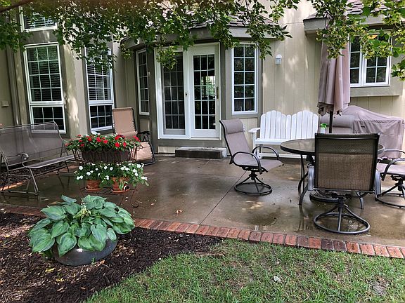 Patio in fenced backyard