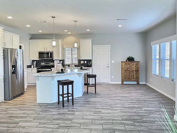 Spacious kitchen with beautiful wood work
