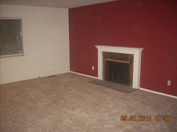 Living Room with wood fireplace.