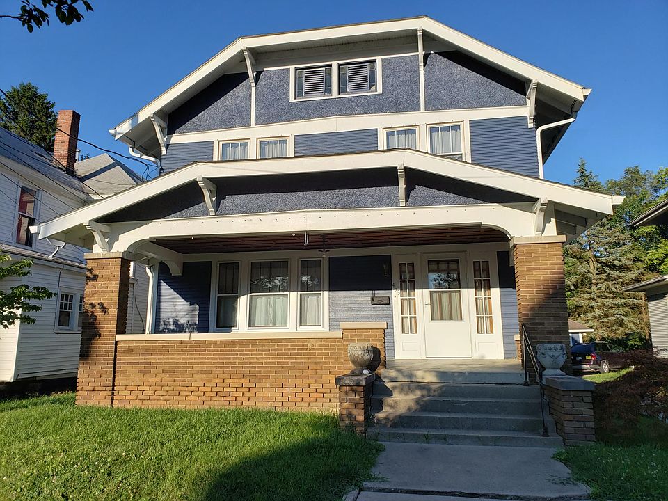 House painted Indigo Blue and most windows replaced! New storm doors front and rear. Large front covered porch.