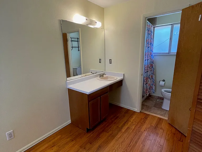 Third bedroom sink and bathroom.