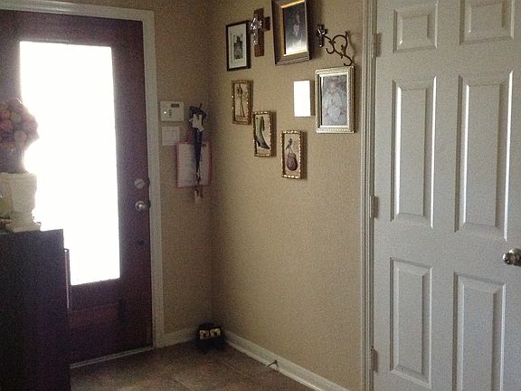 Entryway with garage door