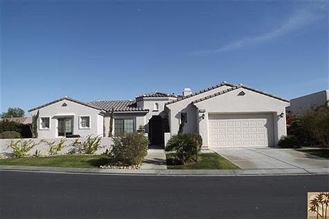 Beautiful front elevation - Spanish Style with private courtyard entry
